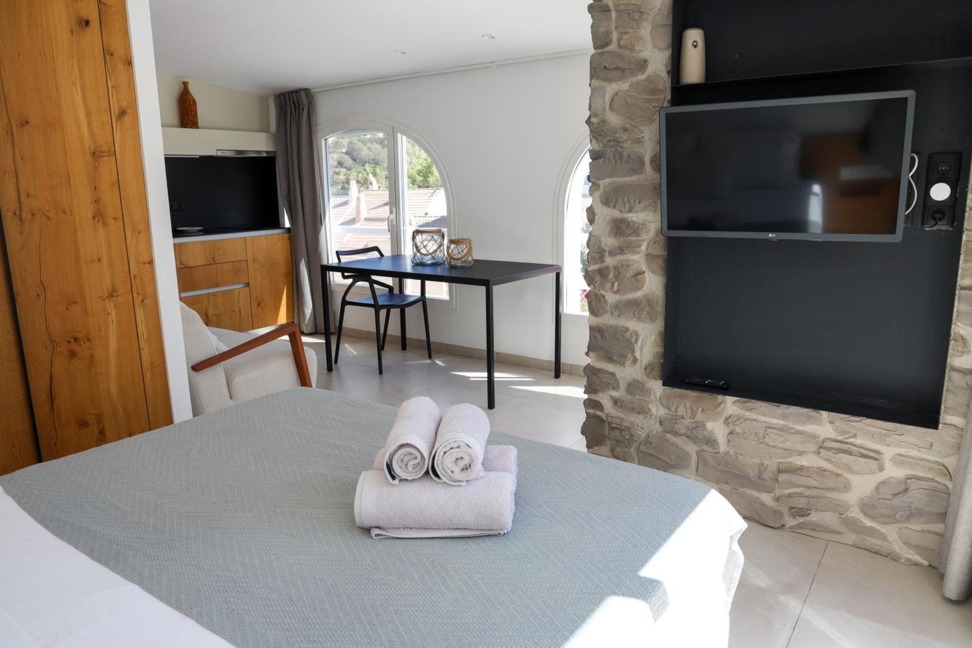 Cala Vadella Beachwalk Suites Стая снимка